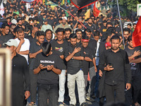 Thousands of Shia Muslims are attending the mourning procession to commemorate the martyrdom of Prophet Muhammad's grandson Imam Hussein (Hu...