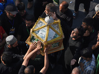 Thousands of Shia Muslims are attending the mourning procession to commemorate the martyrdom of Prophet Muhammad's grandson Imam Hussein (Hu...