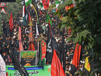 Thousands of Shia Muslims are attending the mourning procession to commemorate the martyrdom of Prophet Muhammad's grandson Imam Hussein (Hu...