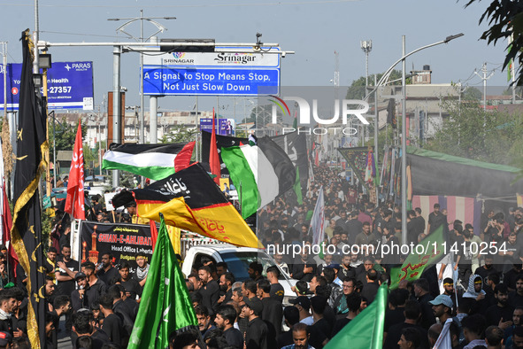 Thousands of Shia Muslims are attending the mourning procession to commemorate the martyrdom of Prophet Muhammad's grandson Imam Hussein (Hu...