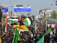 Thousands of Shia Muslims are attending the mourning procession to commemorate the martyrdom of Prophet Muhammad's grandson Imam Hussein (Hu...