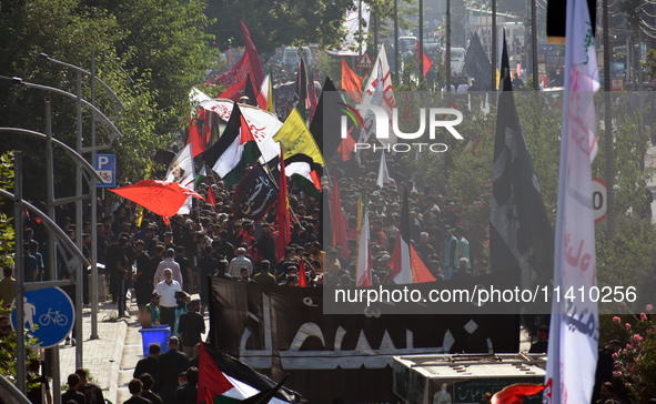 Thousands of Shia Muslims are attending the mourning procession to commemorate the martyrdom of Prophet Muhammad's grandson Imam Hussein (Hu...