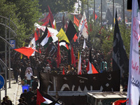 Thousands of Shia Muslims are attending the mourning procession to commemorate the martyrdom of Prophet Muhammad's grandson Imam Hussein (Hu...