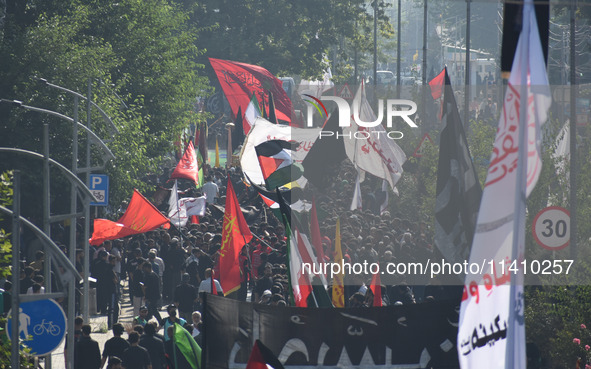 Thousands of Shia Muslims are attending the mourning procession to commemorate the martyrdom of Prophet Muhammad's grandson Imam Hussein (Hu...