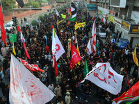 Kashmiri Shiite Muslim mourners are taking part in a Muharram procession on the eighth day of Ashura in Srinagar, Jammu and Kashmir, on July...