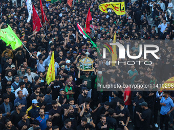 Kashmiri Shiite Muslim mourners are taking part in a Muharram procession on the eighth day of Ashura in Srinagar, Jammu and Kashmir, on July...