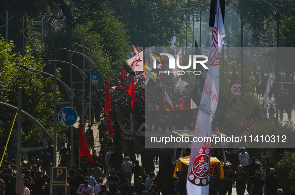 Kashmiri Shiite Muslim mourners are taking part in a Muharram procession on the eighth day of Ashura in Srinagar, Jammu and Kashmir, on July...