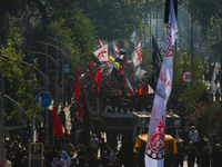 Kashmiri Shiite Muslim mourners are taking part in a Muharram procession on the eighth day of Ashura in Srinagar, Jammu and Kashmir, on July...