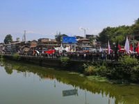 Kashmiri Shiite Muslim mourners are taking part in a Muharram procession on the eighth day of Ashura in Srinagar, Jammu and Kashmir, on July...