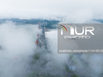 Nine holes are opening to release flood water from the Three Gorges Reservoir in Yichang, Hubei province, China, on July 14, 2024. (