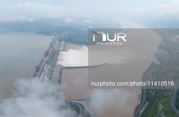 Nine holes are opening to release flood water from the Three Gorges Reservoir in Yichang, Hubei province, China, on July 14, 2024. 