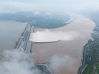 Nine holes are opening to release flood water from the Three Gorges Reservoir in Yichang, Hubei province, China, on July 14, 2024. (