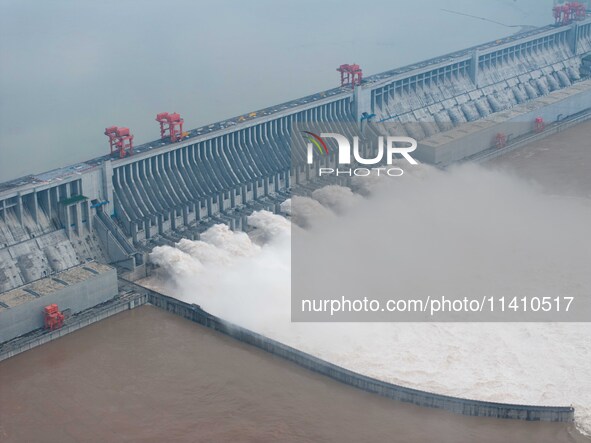 Nine holes are opening to release flood water from the Three Gorges Reservoir in Yichang, Hubei province, China, on July 14, 2024. 