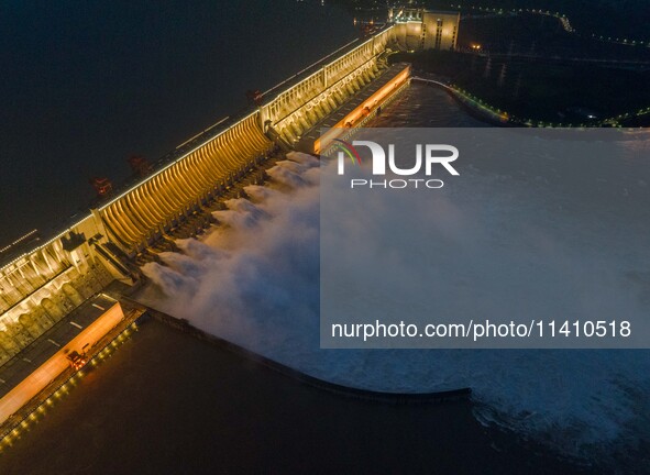 Nine holes are opening to release flood water from the Three Gorges Reservoir in Yichang, Hubei province, China, on July 14, 2024. 