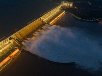 Nine holes are opening to release flood water from the Three Gorges Reservoir in Yichang, Hubei province, China, on July 14, 2024. (