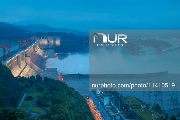 Nine holes are opening to release flood water from the Three Gorges Reservoir in Yichang, Hubei province, China, on July 14, 2024. 