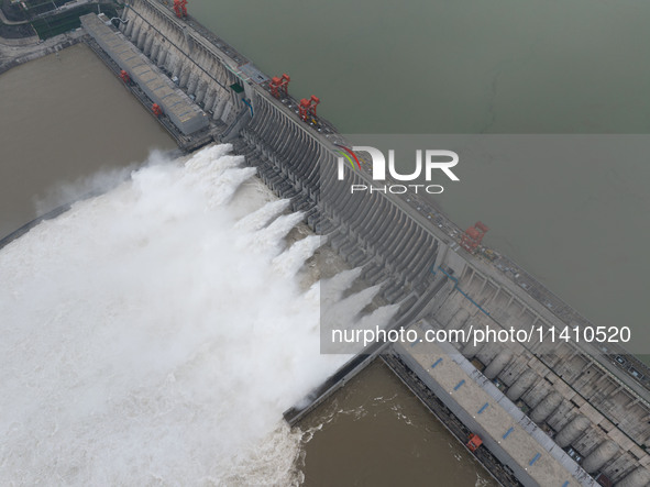 Nine holes are opening to release flood water from the Three Gorges Reservoir in Yichang, Hubei province, China, on July 14, 2024. 