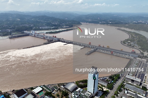 The Gezhouba Dam Water Conservancy Key project of the Yangtze River is opening to release floodwater in Yichang, Hubei province, China, on J...