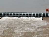 The Gezhouba Dam Water Conservancy Key project of the Yangtze River is opening to release floodwater in Yichang, Hubei province, China, on J...