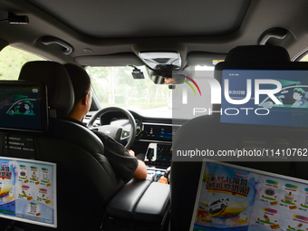 A general view is showing Luobo Kuai Pao, the Baidu Robotaxi, launching test runs in the Jiading area of Shanghai, China, on July 15, 2024....