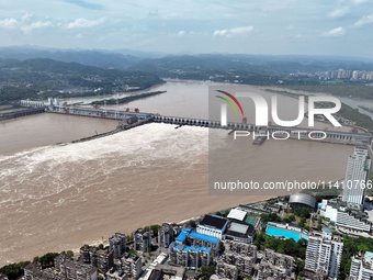 The Gezhouba Dam Water Conservancy Key project of the Yangtze River is opening to release floodwater in Yichang, Hubei province, China, on J...