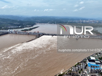 The Gezhouba Dam Water Conservancy Key project of the Yangtze River is opening to release floodwater in Yichang, Hubei province, China, on J...