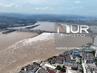 The Gezhouba Dam Water Conservancy Key project of the Yangtze River is opening to release floodwater in Yichang, Hubei province, China, on J...