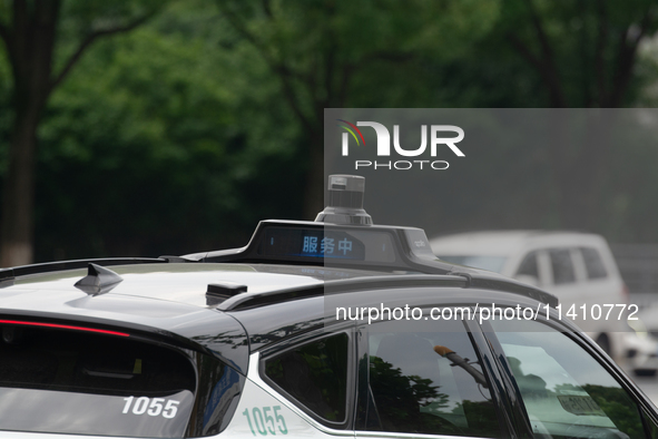 A general view is showing Luobo Kuai Pao, the Baidu Robotaxi, launching test runs in the Jiading area of Shanghai, China, on July 15, 2024. 