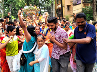 Devotees are taking part in a procession of Ulto Rath Yatra (Return Chariot Procession) in Siliguri, India, on July 15, 2024. (