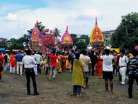 Devotees are taking part in a procession of Ulto Rath Yatra (Return Chariot Procession) in Siliguri, India, on July 15, 2024. (