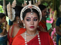 An artist is waiting to perform on the last day of the week-long celebration of Rath Yatra, or chariot procession, in Kolkata, India, on Jul...