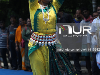 An artist is performing on the last day of the week-long celebration of Rath Yatra, or chariot procession, in Kolkata, India, on July 15, 20...