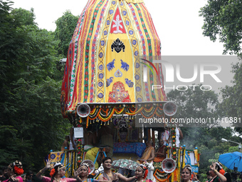 Artists are performing on the last day of the week-long celebration of Rath Yatra, or chariot procession, in Kolkata, India, on July 15, 202...