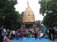 Artists are performing on the last day of the week-long celebration of Rath Yatra, or chariot procession, in Kolkata, India, on July 15, 202...