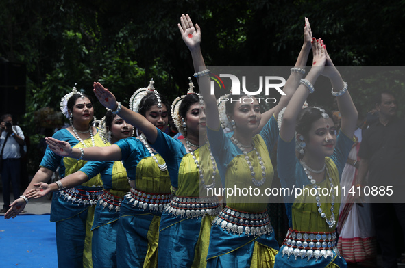 Artists are performing on the last day of the week-long celebration of Rath Yatra, or chariot procession, in Kolkata, India, on July 15, 202...