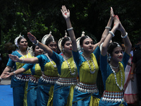 Artists are performing on the last day of the week-long celebration of Rath Yatra, or chariot procession, in Kolkata, India, on July 15, 202...