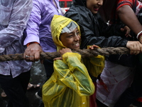 A Hindu boy is pulling a ''Rath'', or the chariot of Lord Jagannath, to seek blessings on the last day of the week-long celebration of Lord...