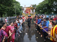 Hindu devotees are pulling the ''Rath'' or the chariot of Lord Jagannath, on the last day of the week-long celebration of Rath Yatra, or cha...