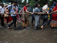 Hindu devotees are pulling the ''Rath'' or the chariot of Lord Jagannath, on the last day of the week-long celebration of Rath Yatra, or cha...