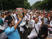 Hindu devotees are dancing and singing religious songs on the last day of the week-long celebration of Rath Yatra, or chariot procession, in...