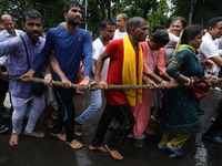 Hindu devotees are pulling the ''Rath'' or the chariot of Lord Jagannath, on the last day of the week-long celebration of Rath Yatra, or cha...