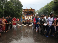 Hindu devotees are pulling the ''Rath'' or the chariot of Lord Jagannath, on the last day of the week-long celebration of Rath Yatra, or cha...