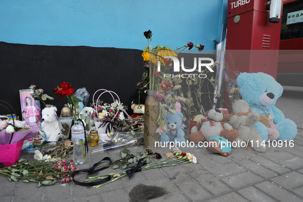 Toys and vigil lanterns are commemorating those killed by the Russian missile attack on the Ohmatdyt National Specialized Children's Hospita...