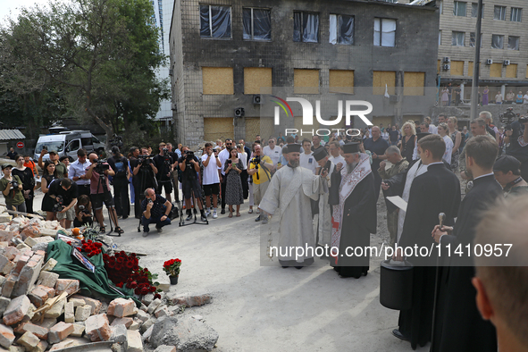 Metropolitan Epiphanius, Primate of the Orthodox Church of Ukraine, is attending the requiem for the victims of the Russian missile attack o...