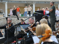 Musicians of the Kyiv Classic Orchestra are performing during the requiem for the victims of the Russian missile attack on the Ohmatdyt Nati...