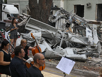 Musicians of the Kyiv Classic Orchestra are performing during the requiem for the victims of the Russian missile attack on the Ohmatdyt Nati...