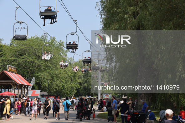 People are enjoying the skyride on Centre Island in Toronto, Ontario, Canada, on July 13, 2024. 