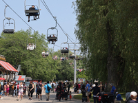 People are enjoying the skyride on Centre Island in Toronto, Ontario, Canada, on July 13, 2024. (