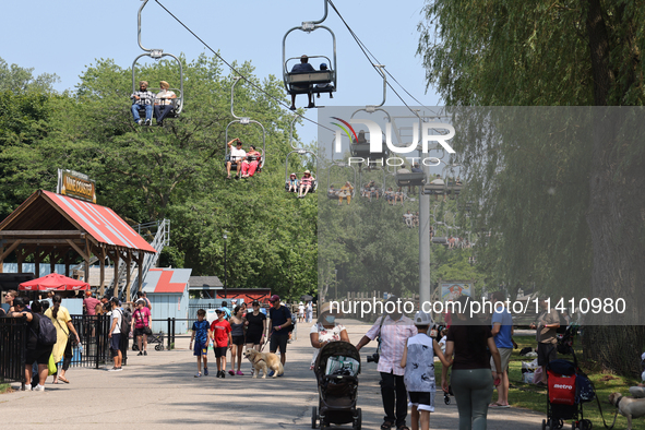 People are enjoying the skyride on Centre Island in Toronto, Ontario, Canada, on July 13, 2024. 