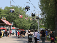 People are enjoying the skyride on Centre Island in Toronto, Ontario, Canada, on July 13, 2024. (